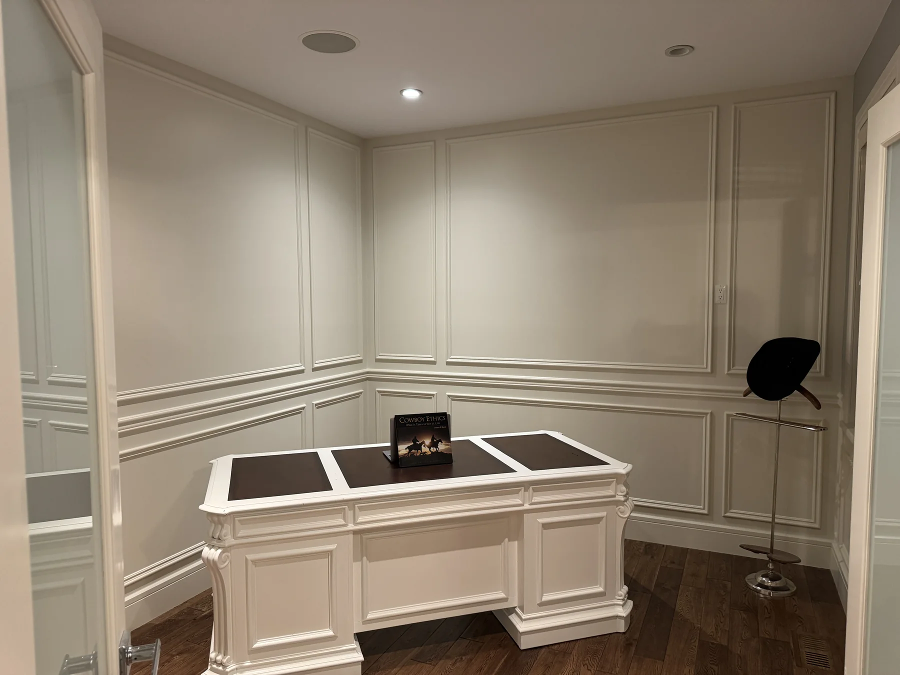 Full-height custom wall paneling in the home office