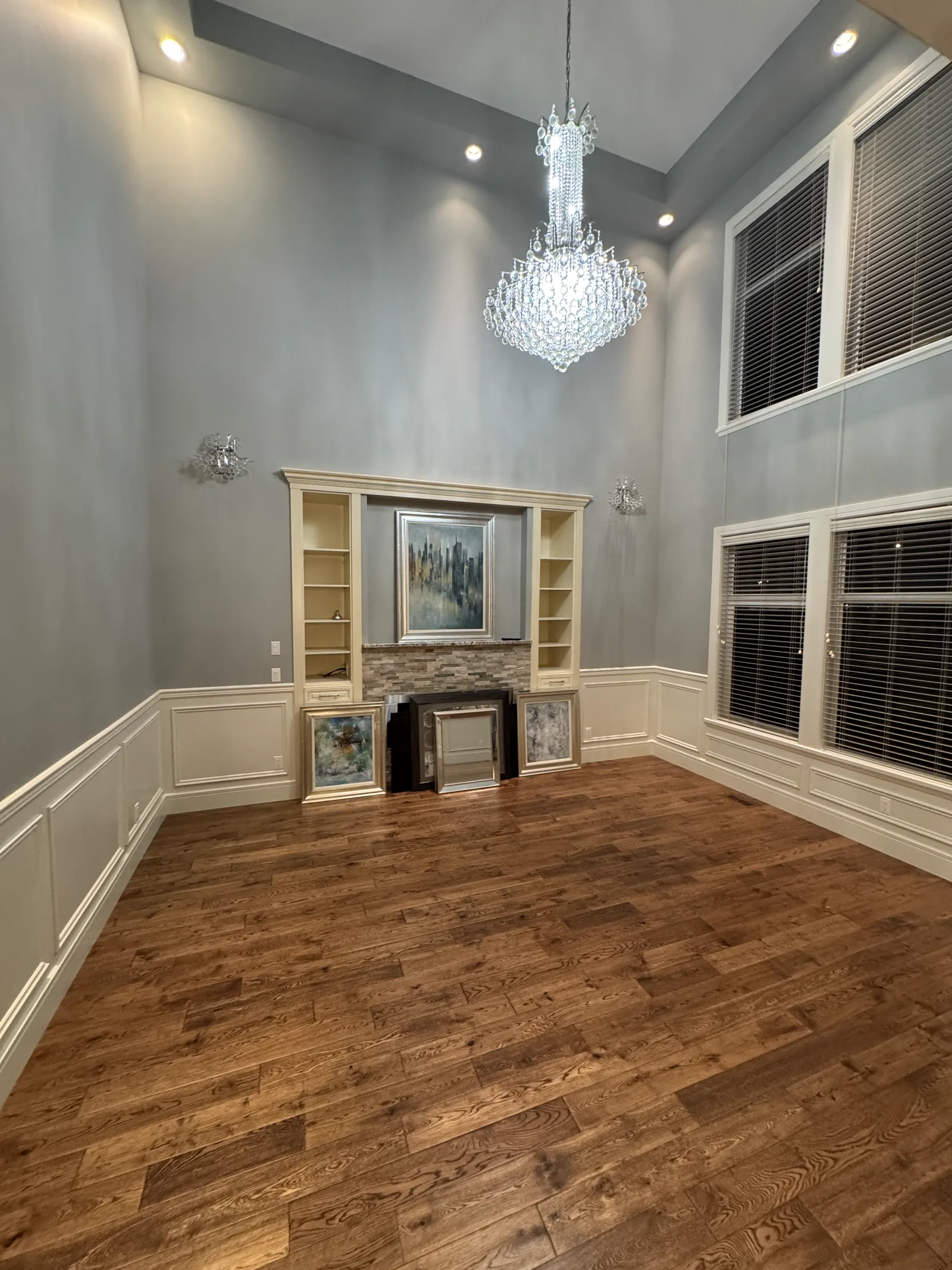 Fireplace millwork and full-room wainscoting by Calgary Custom Concepts