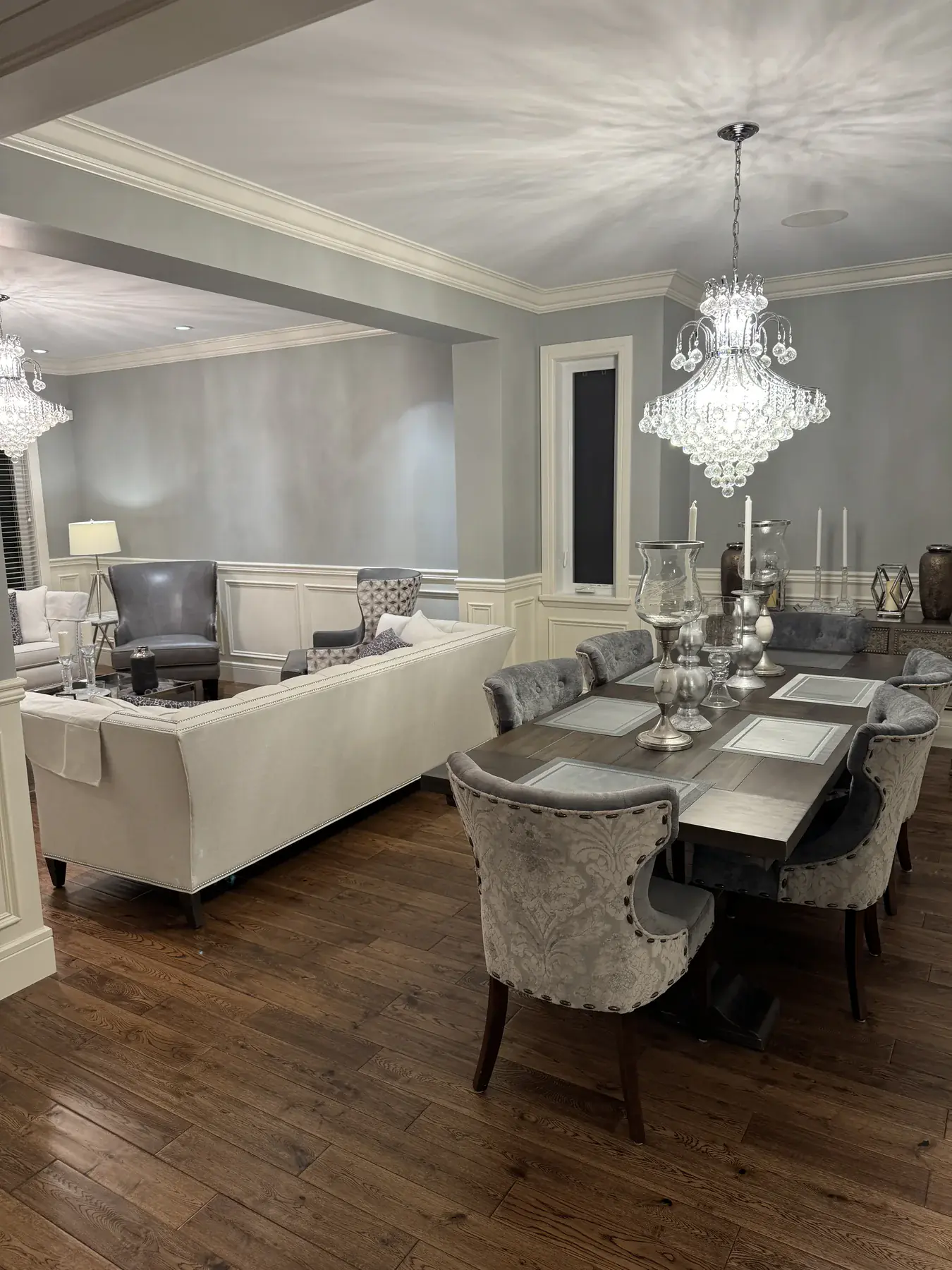 Completed wainscoting connecting the living and dining rooms